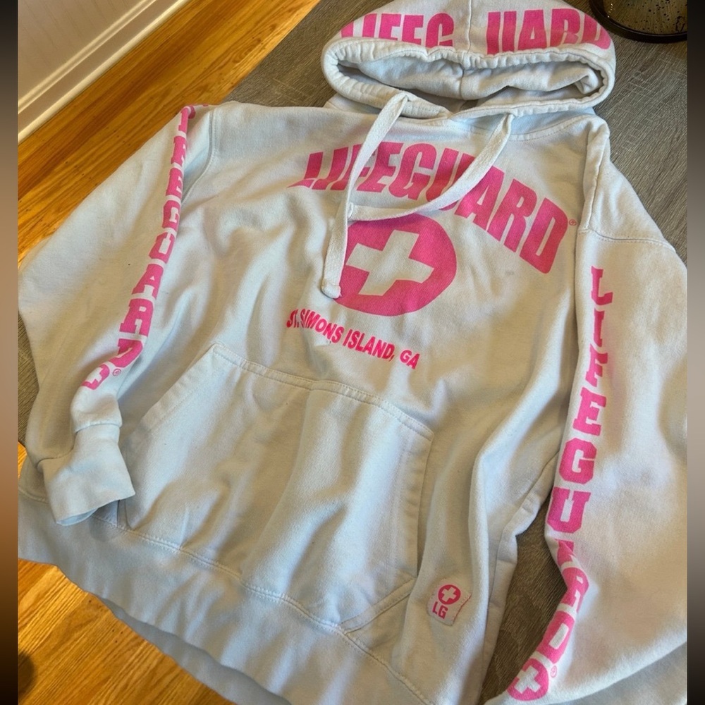 All white and pink lifeguard hoodie
